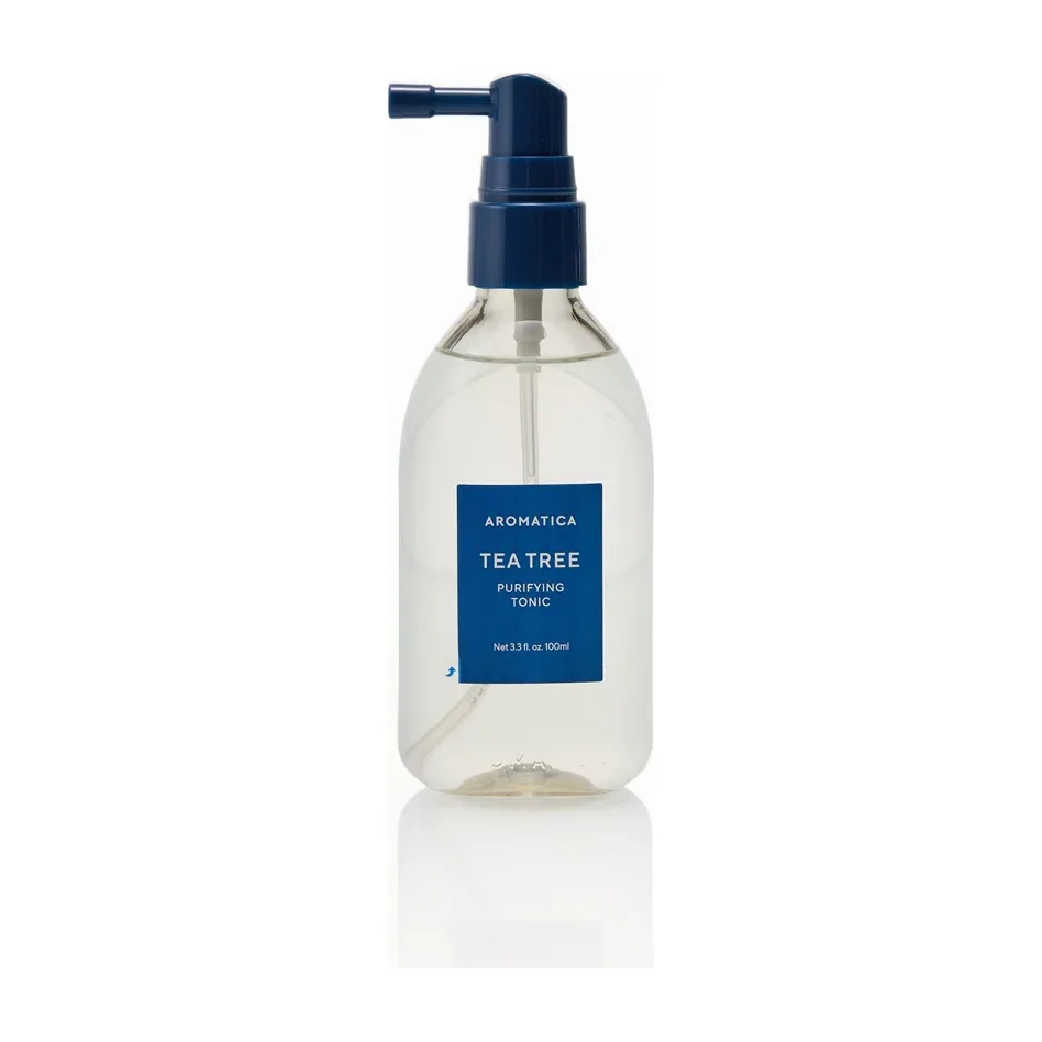 Aromatica Tea Tree Purifying Tonic scalp treatment in a clear bottle with a navy angled applicator nozzle, 100 ml