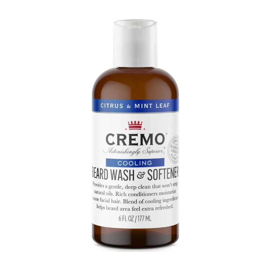 Cremo Cooling Beard & Face Wash in a dark bottle with citrus mint leaf label