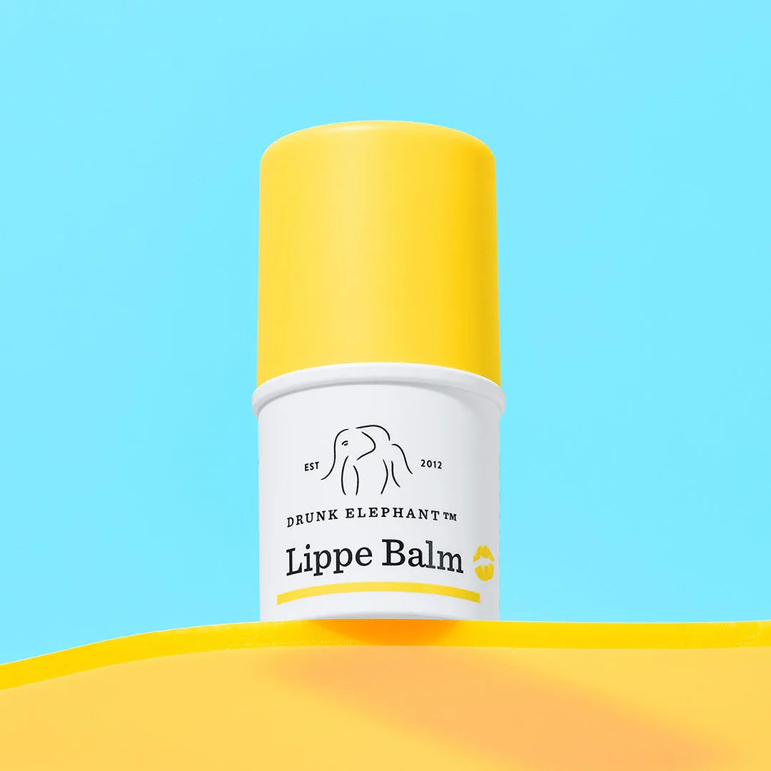Drunk Elephant Lippe Balm twist-up stick on white background