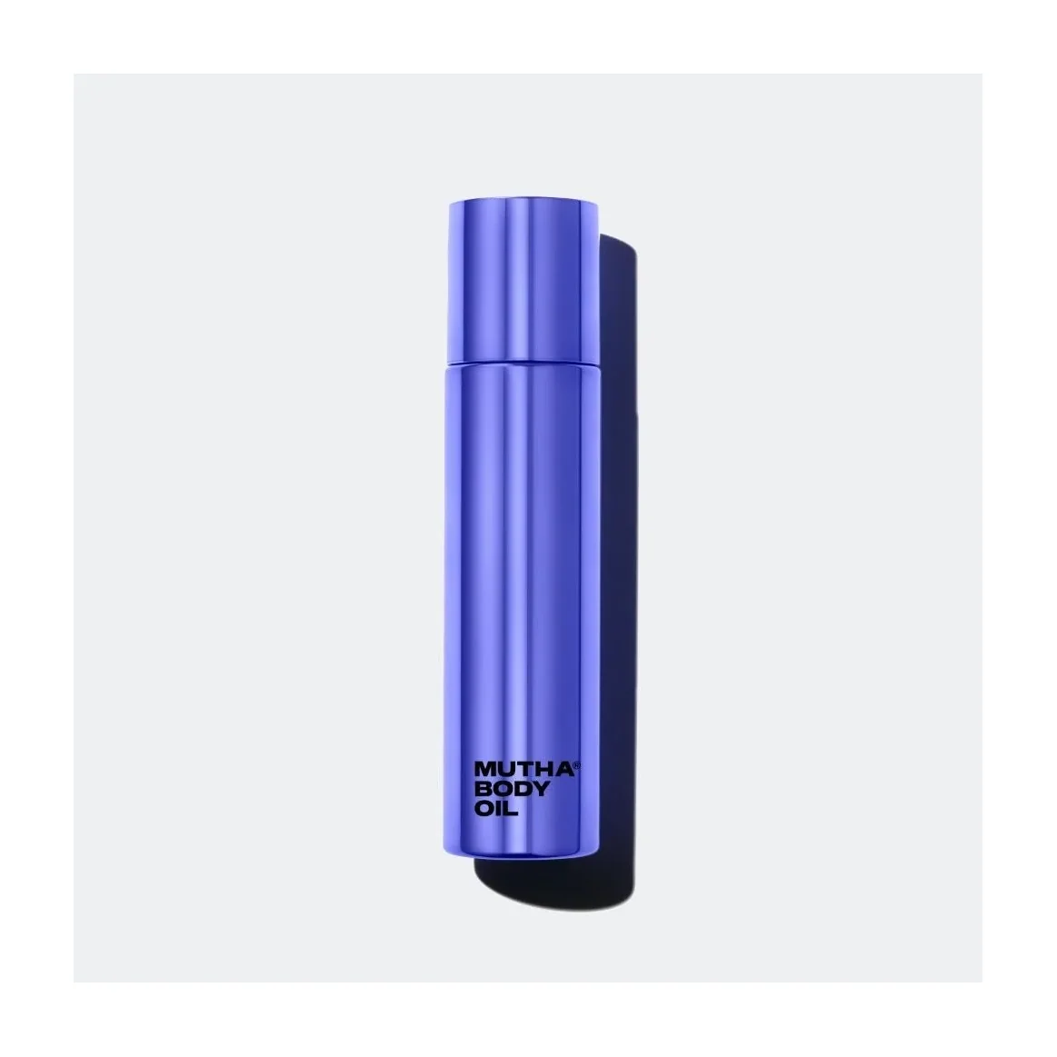 MUTHA Body Oil in a cobalt blue 100ml pump bottle